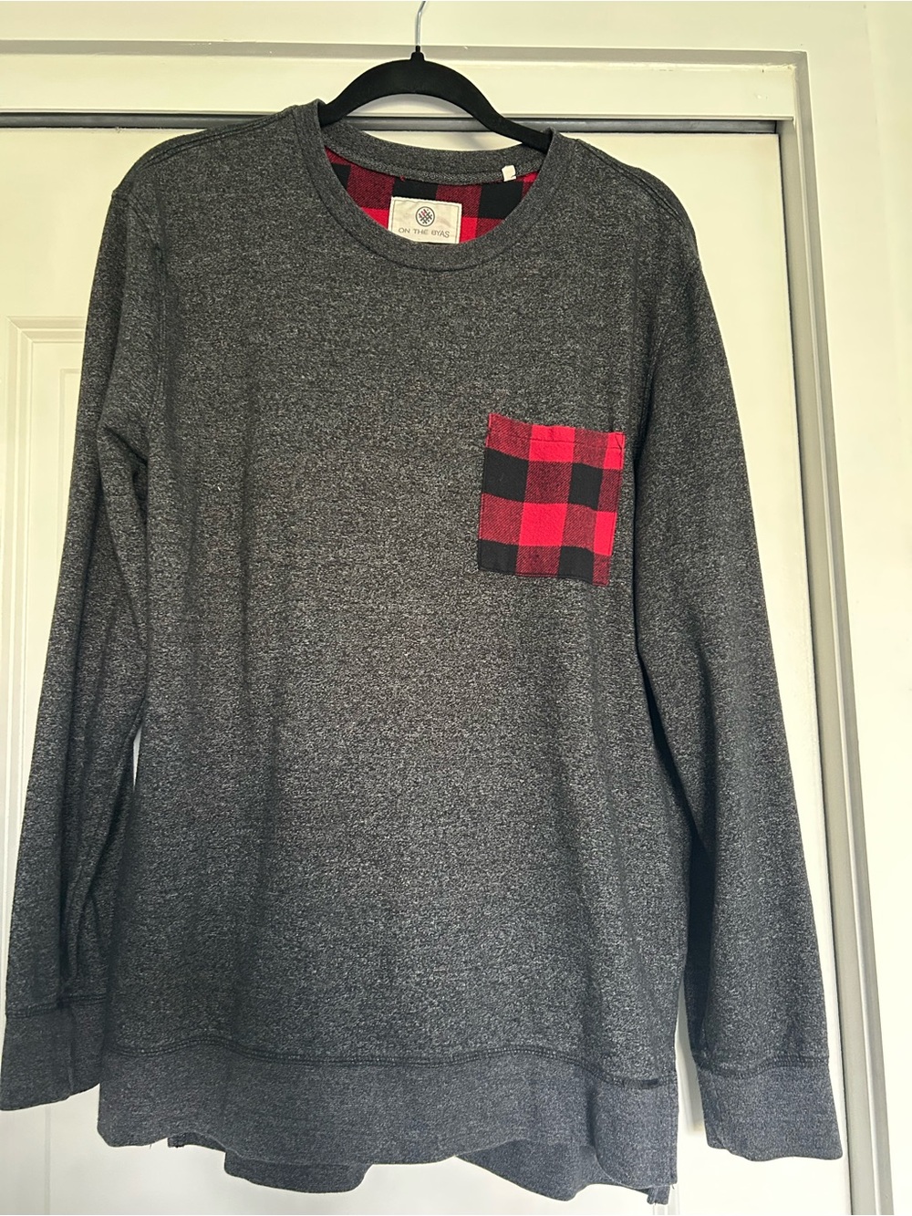on the byas Charcoal Gray Sweatshirt with Red Buffalo Plaid Trim